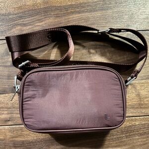 Lolë Burgundy Crossbody Belt Bag